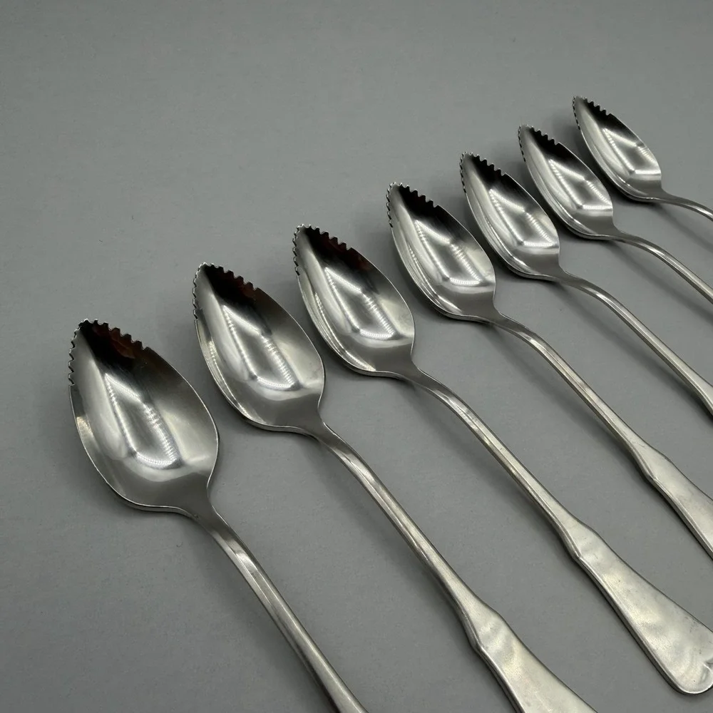 Oneida Community PATRICK HENRY 7pcs Grapefruit Spoons Serrated Stainless